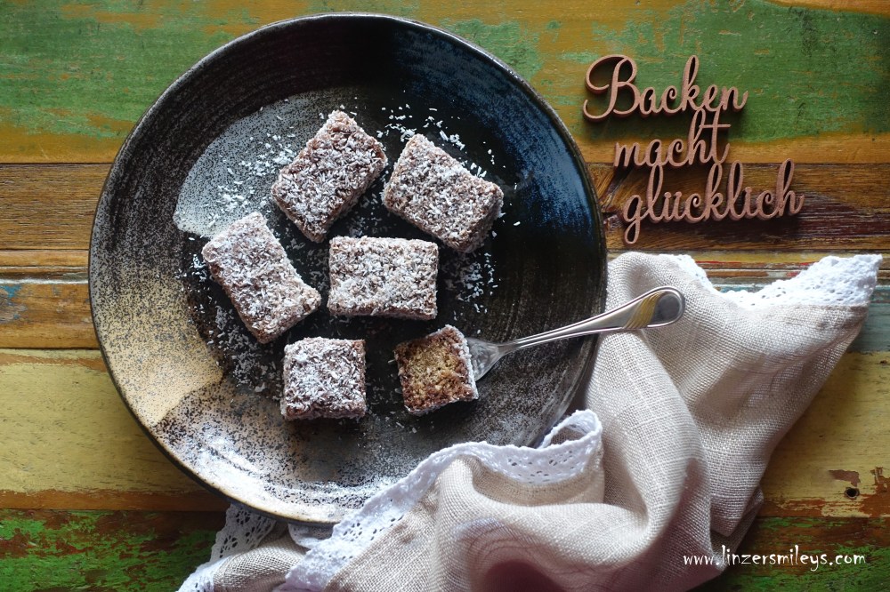Lebkuchen-Lamingtons, beschwipst, mit Rum, alkoholisch, feine Rumnote, Lebkuchen, backen für Weihnachten, weihnachtlich, Gewürze, Kokos, Lamingtons, getränkte Kuchenwürfel, mit Kakaoglasur, Kokosflocken, australisch, österreichisch, saftig, köstlich, Süßes, länger haltbar #linzersmileys
