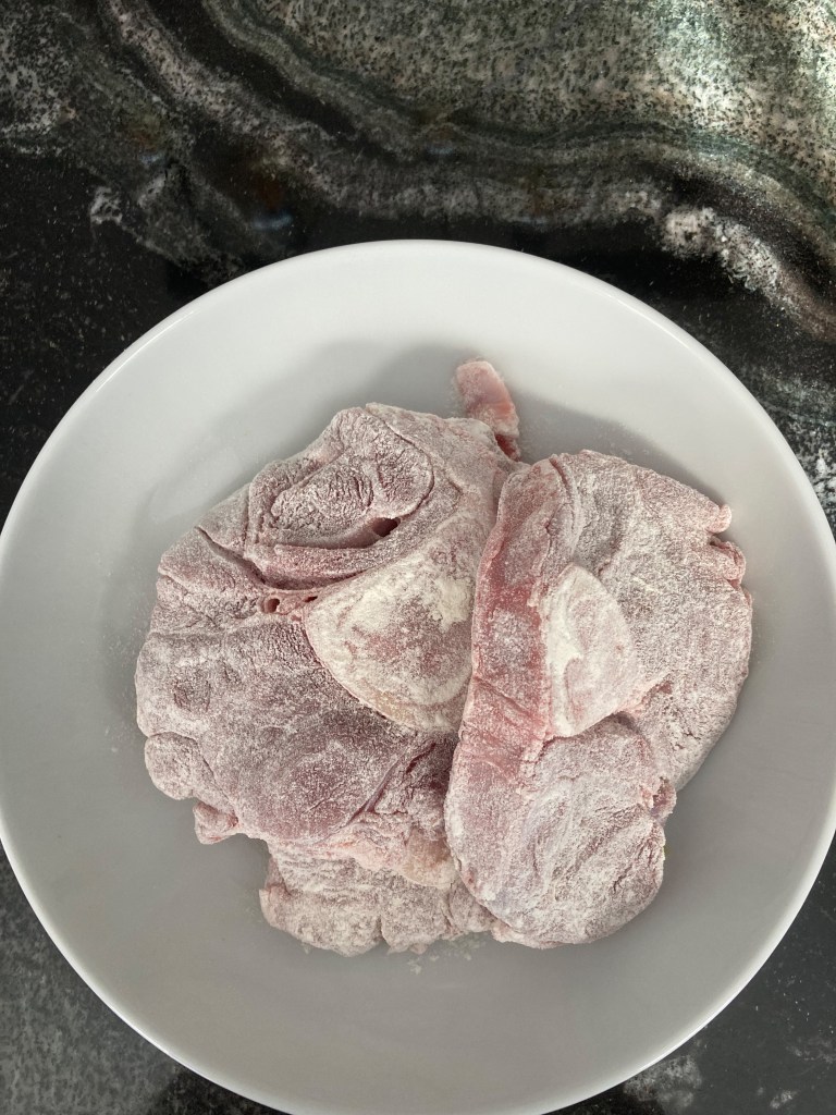 Zubereitung Ossobuco alla romana vom Tiroler Kalb, Kalbsstelze, Kalbshaxe