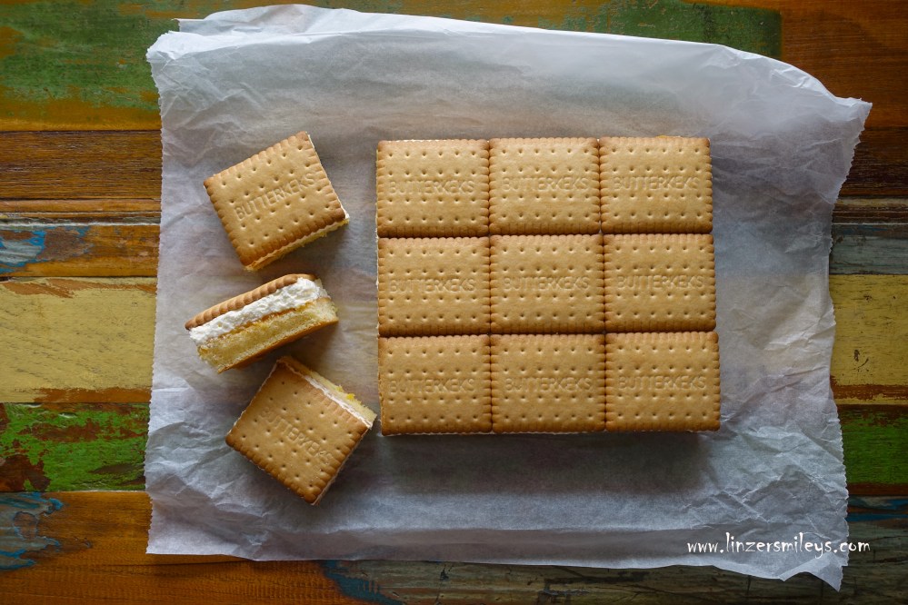 Butterkeks-Kuchen, Freddy-Kekse, mit Rührteig und Vanille-Obers, Vanille-Sahne, mit Marmelade, Konfitüre, DIY, süße Orange, easy-peasy, einfach backen, ohne Waage, Zutaten mit dem Löffel (ab)messen, Rezept von Daniela Terenzi #linzersmileys